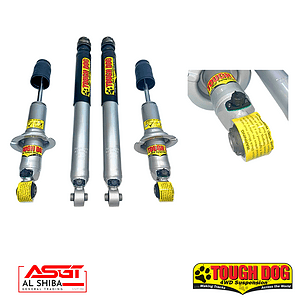 Four Tough Dog 4WD shock absorbers lined up with yellow warning tags and rubber boots, plus close-up view of a component on the right; brand logos at bottom corners.