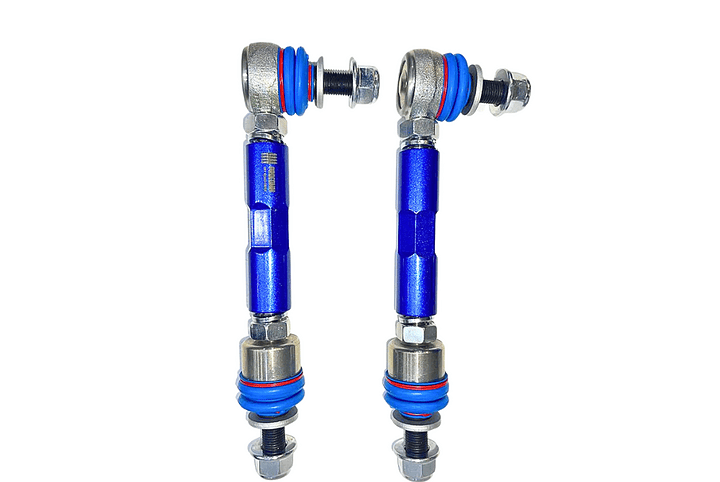 Pair of blue adjustable rear suspension links with nuts and bolts, labeled 'REAR - FJ / PRADO LINKS' under logos for AL SHIBA and PROCOMM OFF ROAD RIDER.